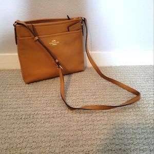 Brown Coach bag with strap